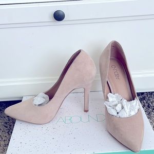 Nude suede pumps